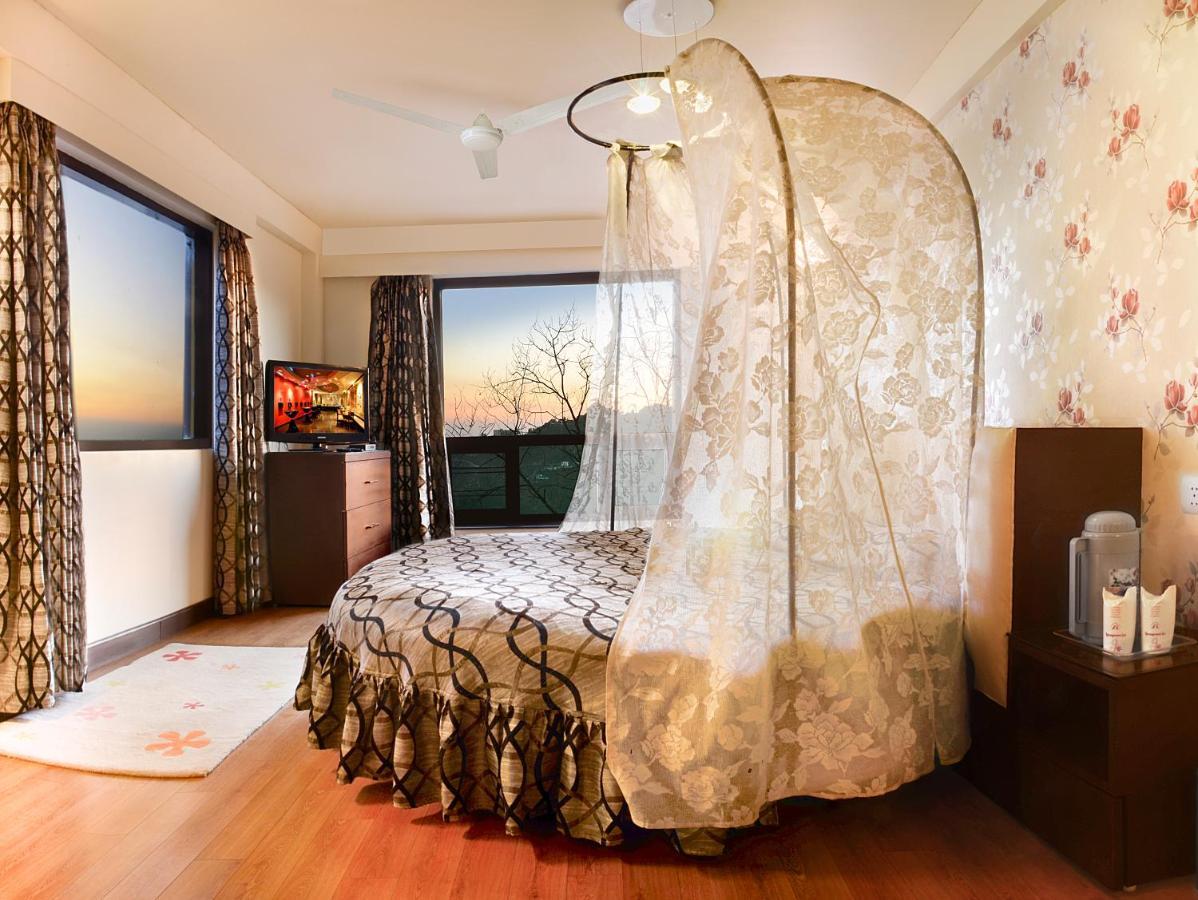 Honeymoon Inn מוסורי חדר תמונה